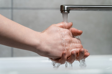 Hand washing during a coronavirus epidemic. Hygiene measures to prevent the spread of COVID-2019