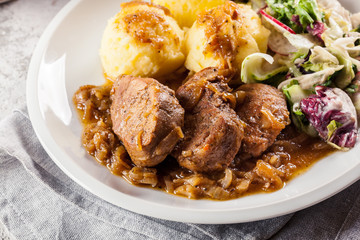 Braised pork loins with onion sauce