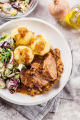 Braised pork loins with onion sauce