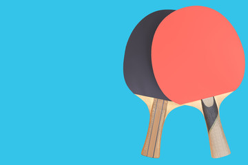 Two tennis rackets for table tennis with isolated on blue background