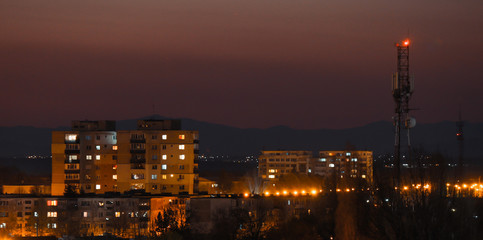 Old city buildings in the dusk , The city of Ploiesti , Romania in the golden light