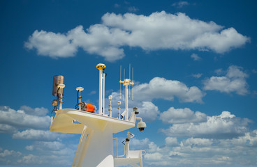 Cruise Ship Communication Equipment Under Blue Sky