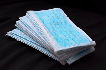 Close-up to face medical mask on red background