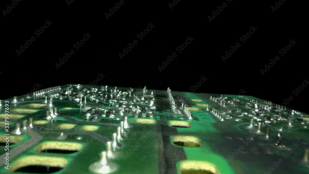 Poster macro slide shot over an electronic circuit board. macro slider shot.