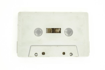 old dirty audio cassette on white background