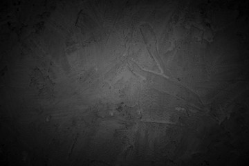 dark background with light on an empty countertop.