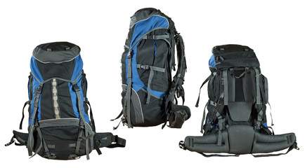 Fototapeta Travel backpack isolated on a white background. Blue filled bag closeup. obraz