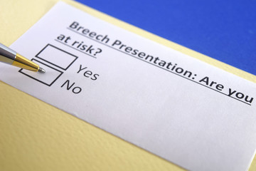 Fototapeta premium One person is answering question about breech presentation.