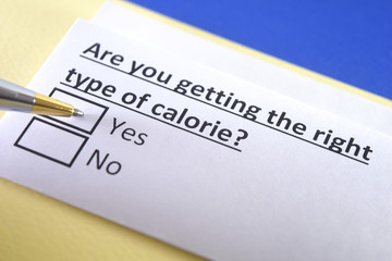 Obraz premium One person is answering question about calorie.