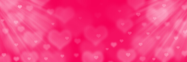 Abstract red bokeh banner background with hearts - birthday, father's day, valentine's day panorama - blurry bokeh circles and hearts on a pink background.