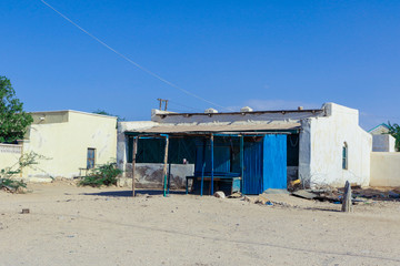 Obraz na płótnie Canvas Berbera, Somaliland - November 10, 2019: Looks like Crushed Streets and Buildings in the Berbera City