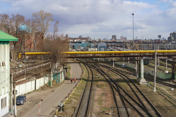 Fototapeta premium Photography of russian railways in the spring sunny day. Long-distance trains. Calmness, freedom, touristic mood. But sfaff only. Coronavirus pandemic lifestyles.
