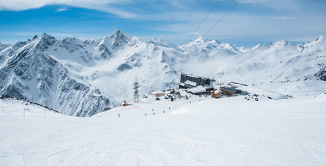 Fototapeta na wymiar High altitude ski resort in Caucasus mountains. Winter alpine view.