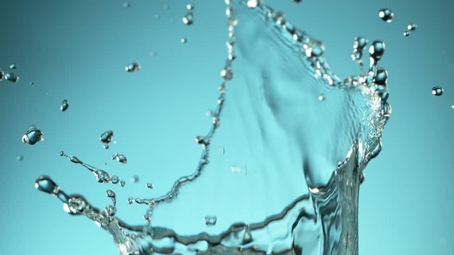 Super slow motion of splashing water crown shape. Filmed on high speed cinema camera, 1000fps.