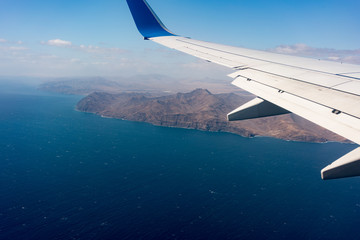 Fototapeta premium Canary Islands mountain landscape under airplane wing