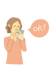 スマートフォンでOKをタップする女性