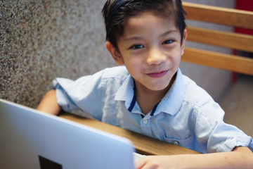Children learning using laptop computer at home. Learn from home quarantine concept. 