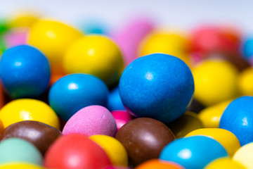 Bright colorful candies. Close up background. Round bright candies.