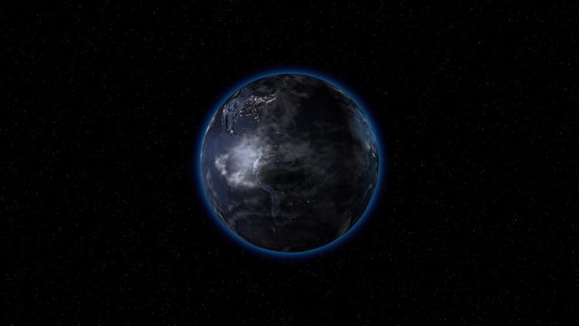 A planet with clouds, spinning in space