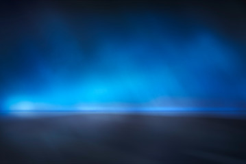 Abstract blue mist studio background.