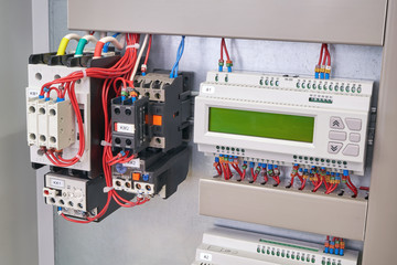 Remote access and control controller with expansion module, two contactors with thermal relays and additional contacts in the electrical Cabinet. Production, installation and maintenance.