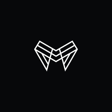 Minimal elegant monogram art logo. Outstanding professional trendy awesome artistic M MM MMM initial based Alphabet icon logo. Premium Business logo White color on black background