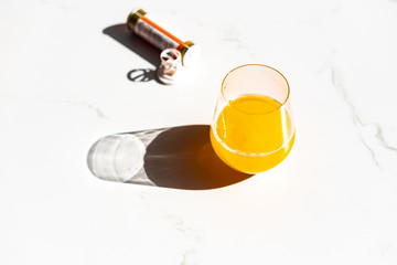 Immune boosting multivitamin effervescent  tablet in glass of water