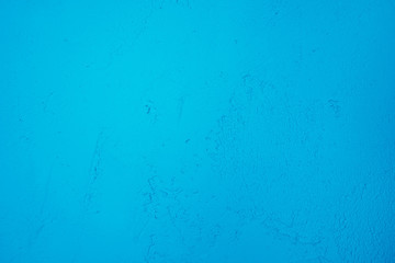 A beautiful Turquoise paint texture on wall, background - Image. Color paint strokes.