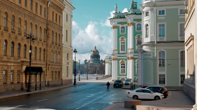 st. petersburg, russia. April 2020: empty streets near hermitage museum, covid epidemic. Sunny day, Isaac cathedral in shot