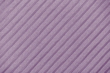 Plisse background toned in trendy color 2020 grape compote. geometric cloth lines. Fabric, textile close up.