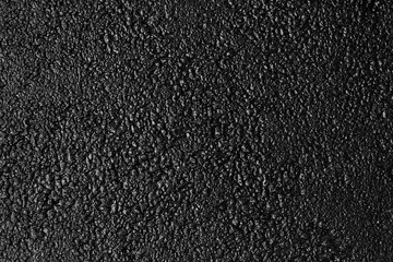 Fototapeta premium Wet abstract background. Texture toned in trendy color of 2020 black.