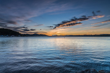Sunrise Waterscape over the Bay with High Clouds