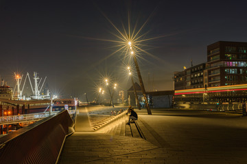 Fototapeta na wymiar Hamburg, Hamburg/Germany - 04112020: Empty Elbpromenade in the night
