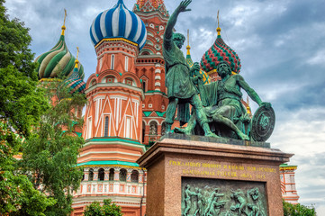 Fototapeta na wymiar Monument to Minin and Pozharsky and St Basil's cathedral on Red Square