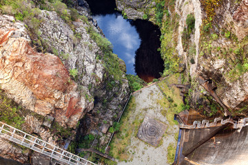 View of the GordView looking down from the top of the dam wall of the Gordon Damon Dam
