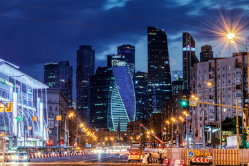 Large panoramic view of Moscow city buildings, modern business center on the banks of the Moscow river in the evening