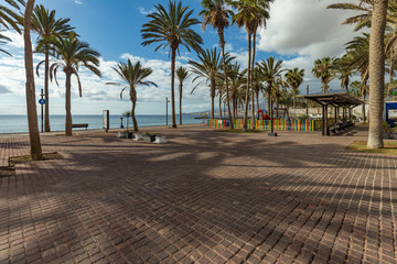 Fototapeta na wymiar Las Americas,Tenerife, Spain March 21, 2020: Quiet, deserted streets of the most popular and crowded tourist resort in the Canary Islands. Isolation regimen during a coronavirus Covid-19 pandemic
