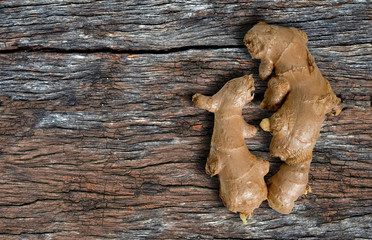 Fresh gingers  on old wood background