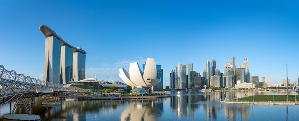 Wide panorama of Singapore skyscrapers at daytime