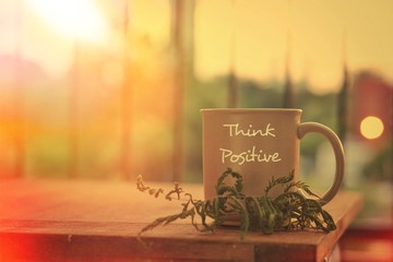 Having fun while enjoying a hot cup of coffee at home (Positive thinking concept) 