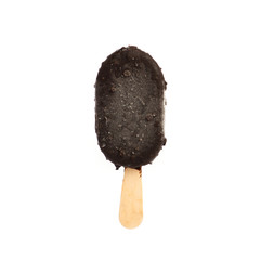 ice cream on a stick in black chocolate isolated on white background