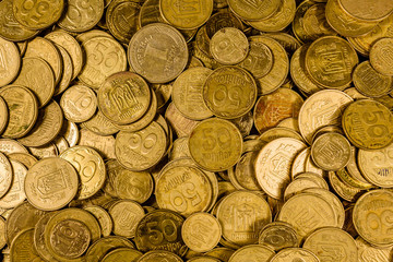 Heap of the ukrainian coins for background