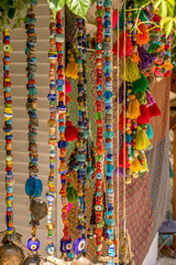 Colourful beaded necklaces and tassels