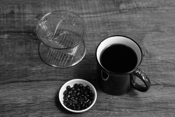 cup of coffee on wooden table