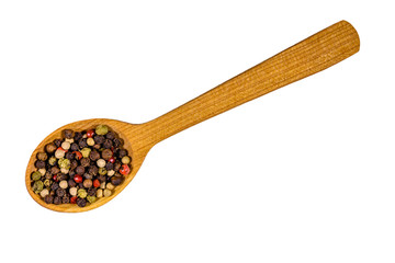 Wooden spoon with different spices isolated on a white background