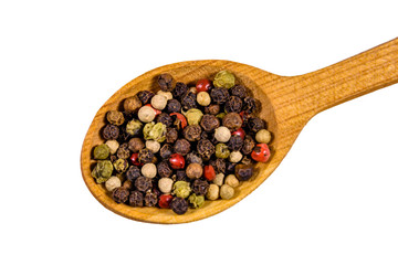 Wooden spoon with different spices isolated on a white background