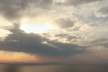 Cloudy summer sunset towards Lesvos in Izmir Dikili TURKEY