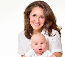 Mother and baby playing and smiling. Happy family.