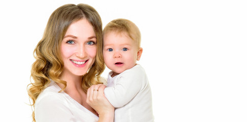Mother and baby playing and smiling. Happy family.