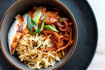asian style chicken noodles onion and sesame